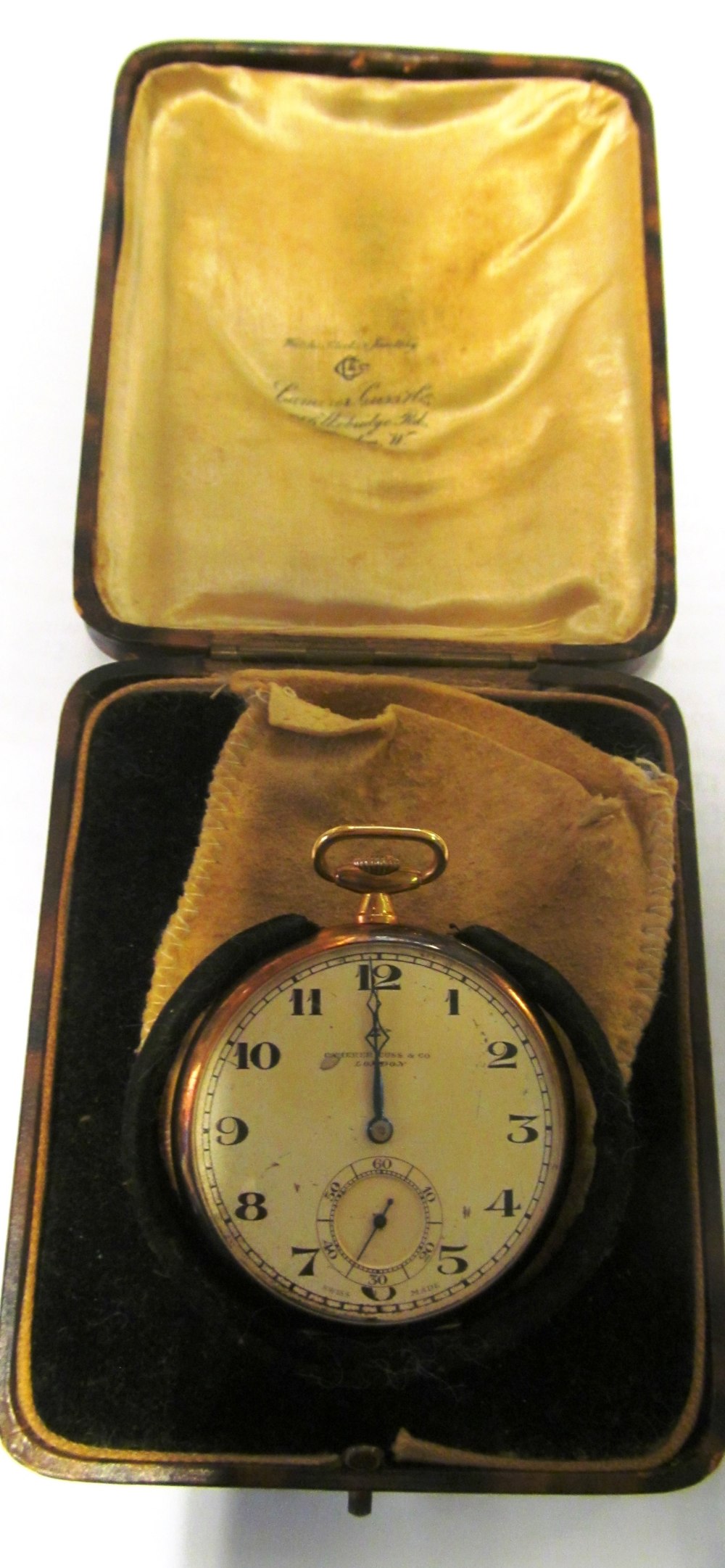 An 18ct Slim Camerer Cuss & Co. pocket watch