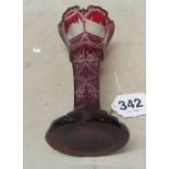A 19th Century Bohemian red and white glass vase with scenes of monuments