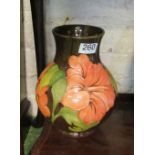 A Moorcroft vase Apricot Hibiscus pattern