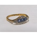 An 18ct gold and platinum sapphire and diamond ring