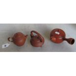 Three Yixing teapots