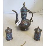 An Islamic brass and enamel coffee pot and two side pots