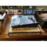 A glass chess set and board (boxed) and a truncheon