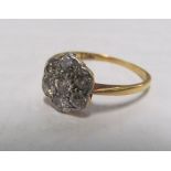 An 18ct gold diamond cluster ring 2.2gms, size O
