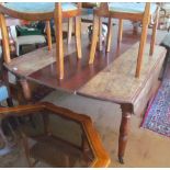 A French mahogany dropleaf table on turned supports with interleaf