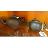 Two Yixing teapots with animal finials