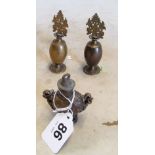 Three Islamic brass small bottles with decorative stoppers