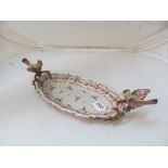 A French pottery dish pink floral design with birds perching on branches as handles