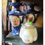 A pair of blue vases and biscuit barrel