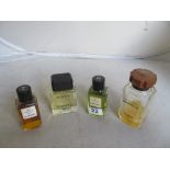 A bottle Chanel No.5 Eau de Toilette, Chanel No.19 Eau de Toilette and two dummy display bottles