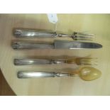 A pair of French Art Deco style Jean-Baptiste Potot salad servers and carving knife and fork