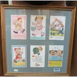 A set of six Lucie Attwell postcards, framed