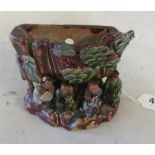 A 19th Century Chinese pottery wall pocket vase with raised figures