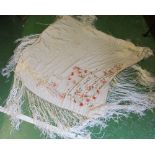 A Victorian cream silk shawl embroidered flowers