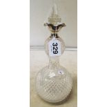 A late Victorian double gourd shaped cut glass decanter with silver collar circa 1887, maker John