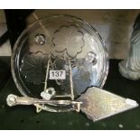 A glass cakestand and silver-plate slicer