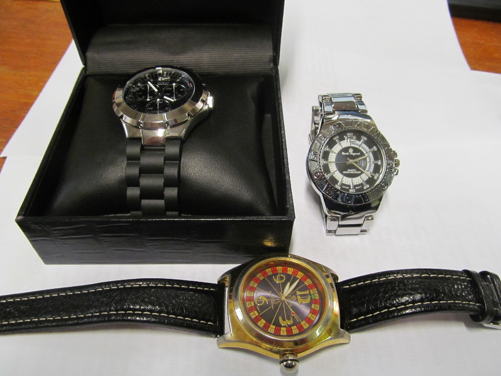 A Guess gent's watch boxed, Charles Raymond gent's watch and an E-Zone gent's watch