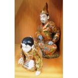 A Satsuma style Japanese figure gentleman seated cross legged and a similar boy kneeling