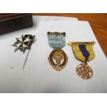 A 9ct gold Past Champion medal, silver medal, two other medals, some buttons et cetera