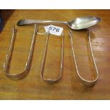 Three pairs silver tongs and silver spoon