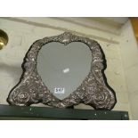An Andrew Barratt & Son large easel mirror with embossed silver-plated front flowers, scrolls and