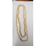 Two pearl necklace 18ct gold mounts