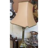 A brass column table lamp with silk shade