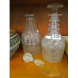 A 19th Century and three ring neck and a 19th Century cut glass decanter with stepped neck and