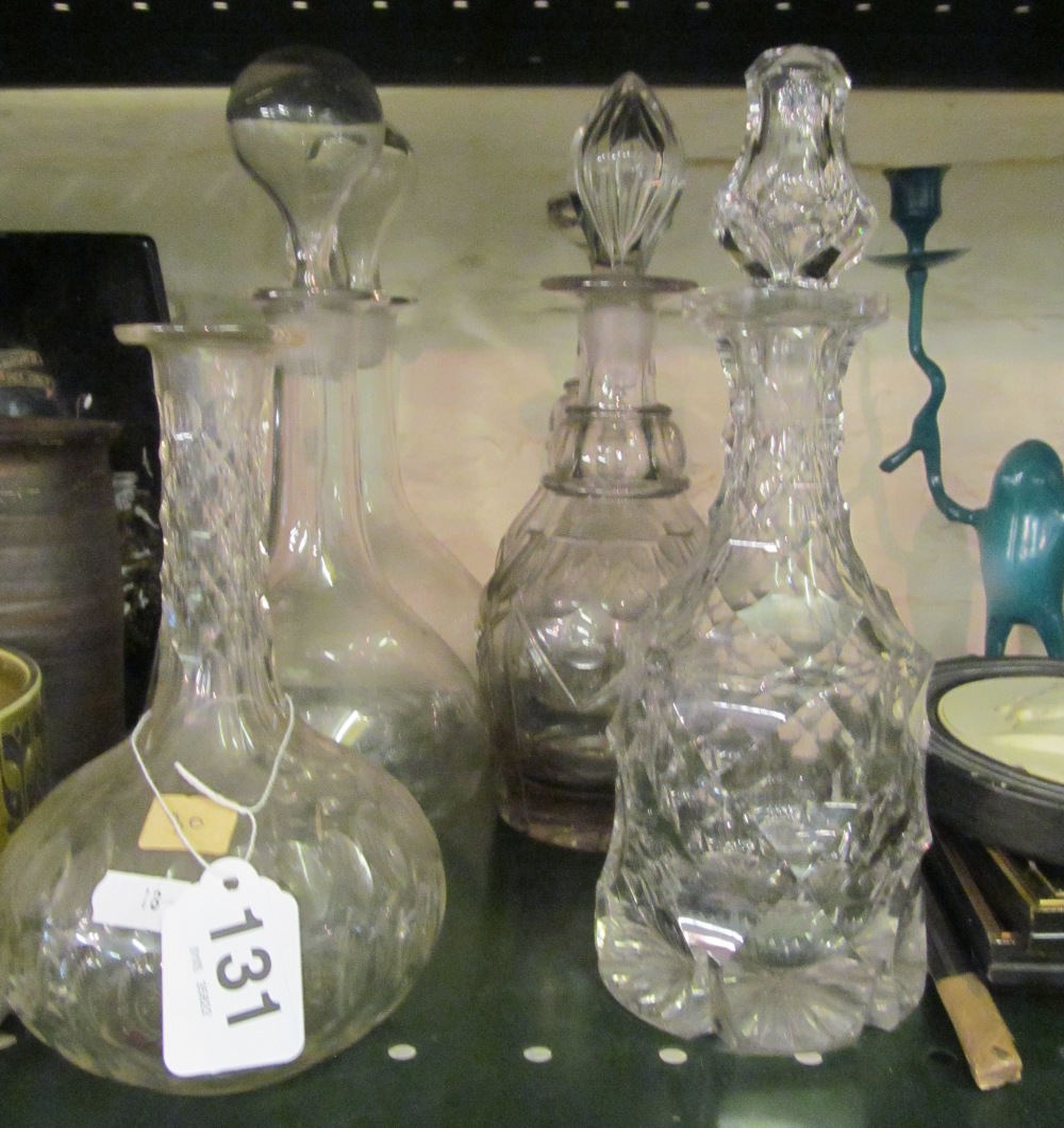 A pair decanters, another pair and two decanters (one without stopper)