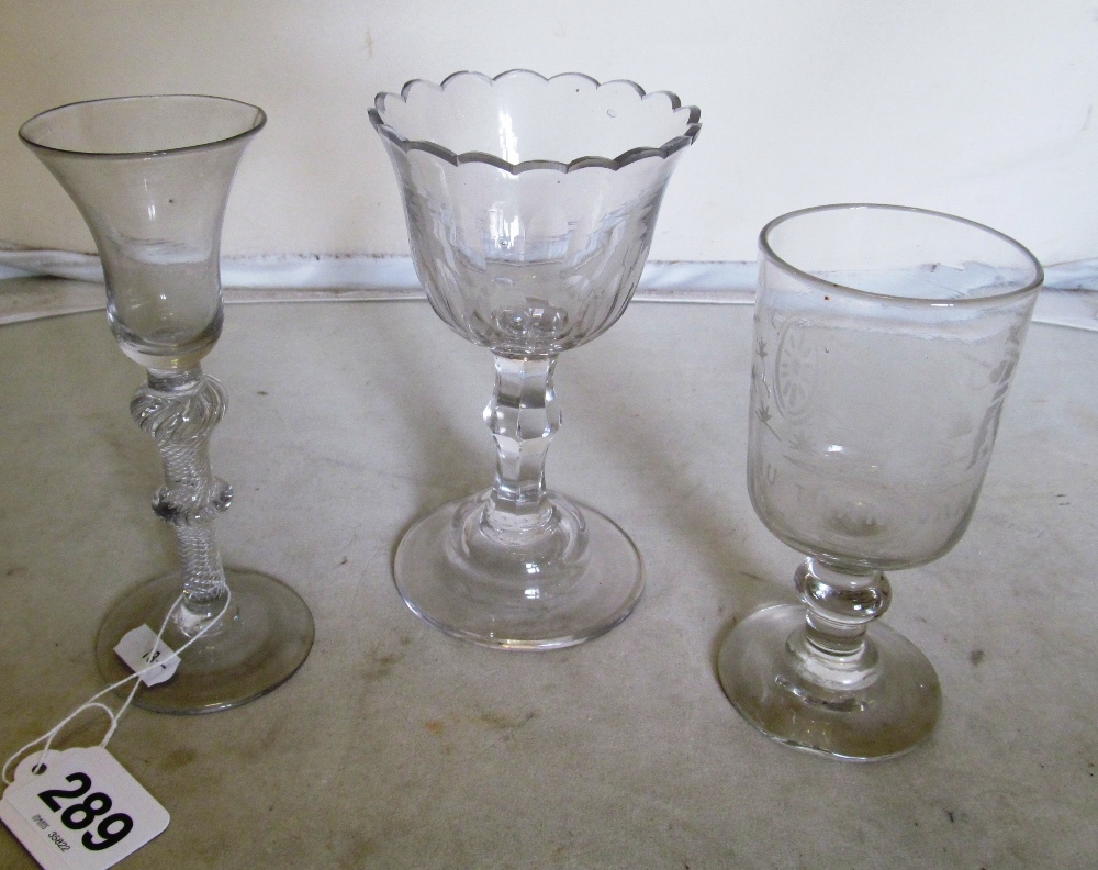 Eight tall old drinking glasses