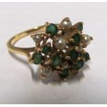 A gold emerald and pearl cluster ring 3.9gms, size Q
