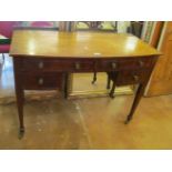 A 19th Century mahogany side table with four drawers on square tapered legs