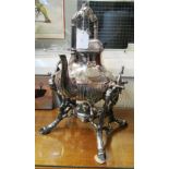 A large Victorian silver-plated spirit kettle on stand embossed garlands of roses
