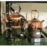 A copper kettle on stand, kettle, pair ebony candlesticks (chipped) and small cannon ball