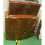 A 1940's walnut cocktail cabinet with rising top and cupboards under with a part set of Art Deco