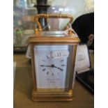 A Thwaites & Reed brass carriage clock