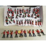 Britains and other lead Scots Guards, some equestrian and huts and other lead models