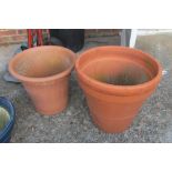Two large terracotta garden pots and some smaller ones