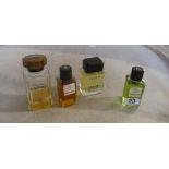 A bottle of Chanel No.5 Eau de Toilette, Chanel No.19 Eau de Toilette and two dummy display bottles