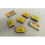 Five boxed Matchbox vehicles and two others