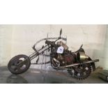 A model motorcycle from recycled bits of metal