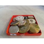 Various compacts and a swimming medal