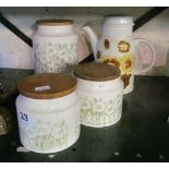 Three Hornsea Pottery kitchen storage jars and a Royal Doulton 'Forest Glen' teapot