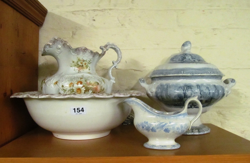 An floral wash jug and basin, Victorian tureen, sauce boat and two dishes and a pierced plate