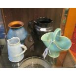 A Dicker Pottery black jug, green basket, blue vase and small jug with twisted handle