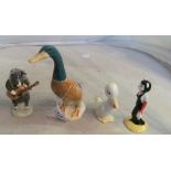 A Beswick model Perfect Pitch, Beswick duck 756-1, another duck and Beswick pig Christopher