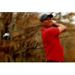 WOODS TIGER: (1975- ) American Golfer, Open Championship winner 2000, 2005 & 2006.
