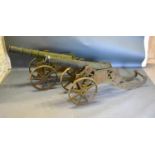A Pair of Wrought And Cast Iron Large Cannon each with a shaped carriage 150cm long