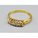 An 18ct Gold Five Stone Diamond Ring, 2.6 grams, ring size M
