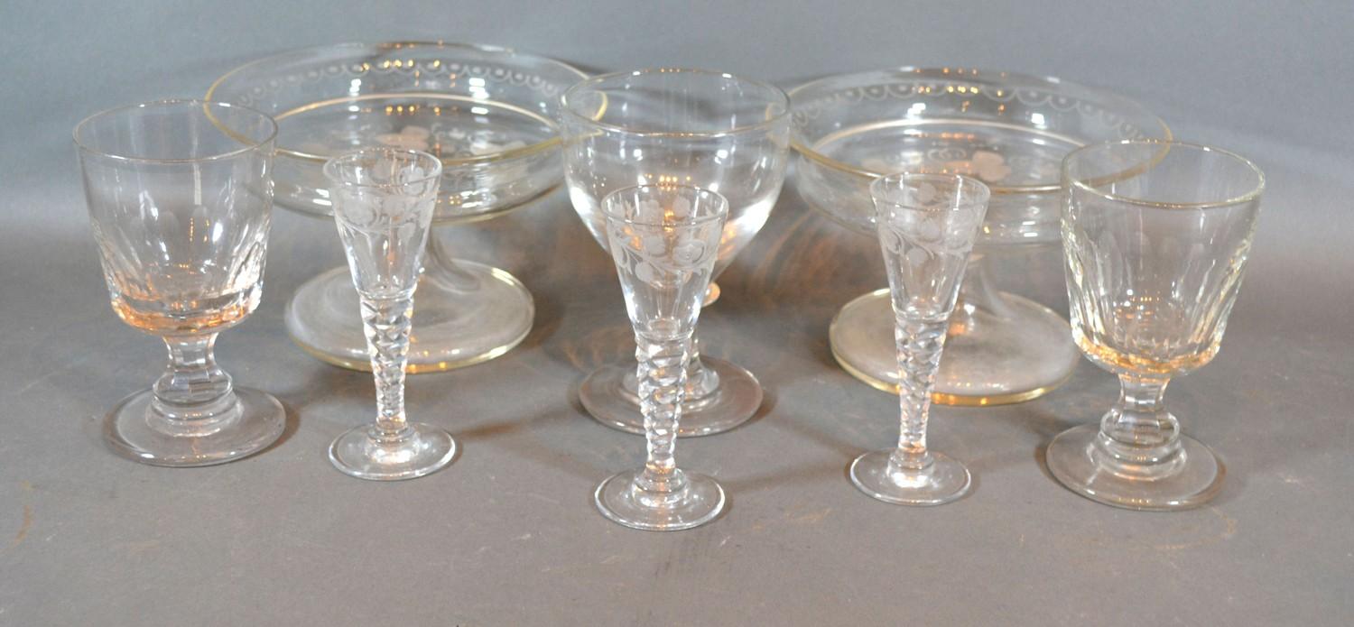 A Pair of Edwardian Glass Comports together with a set of three 19th Century engraved cordial